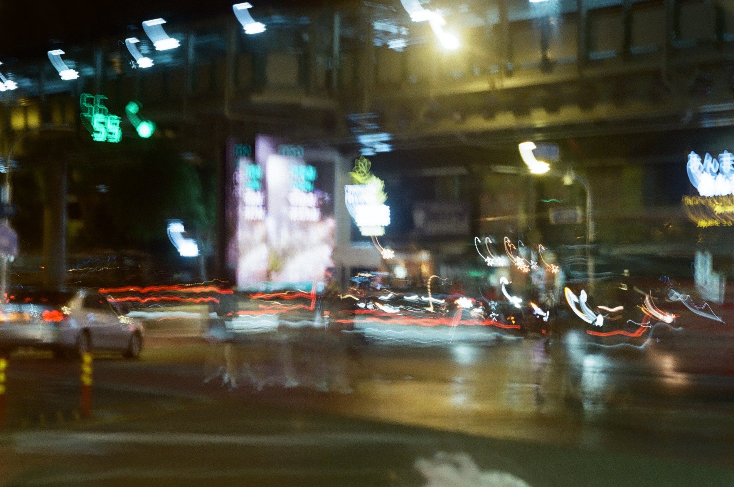 Sukhumvit street crossing at night on film by Arsalan Kamal